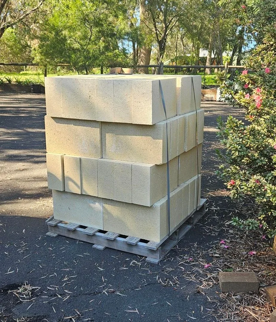 Pallet of limestone blocks strapped and ready for site delivery.